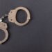 handcuffs on a black table