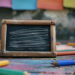 Colorful stationary approaching small chalkboard on floor