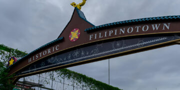Los Angeles, CA, USA - The Historic Filipino town Eastern Gateway as the sun breaks through the storm clouds.