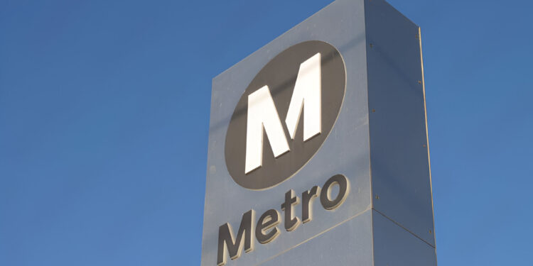 Metro sign is see at a metro station in Los Angeles, California.