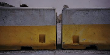 cement protective barriers as a background