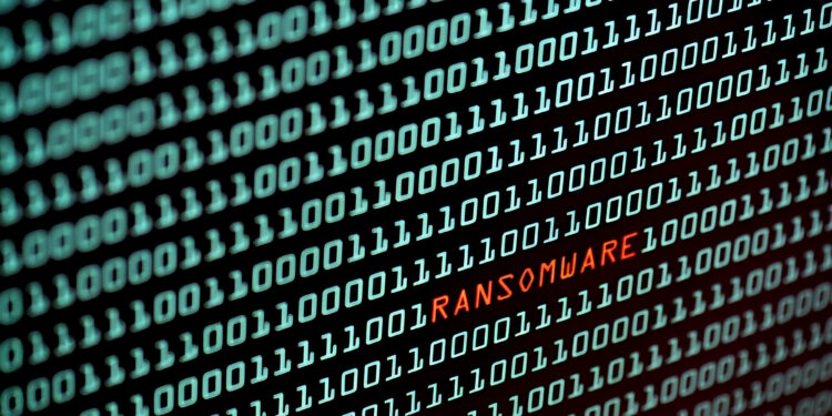 Ransomware or Wannacry text and binary code concept from the desktop screen. concept background, selective focus
