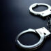 handcuffs dark background photo