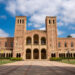 Exterior of Royce Hall building in the campus of UCLA with cloudy sky in the background during sunny day