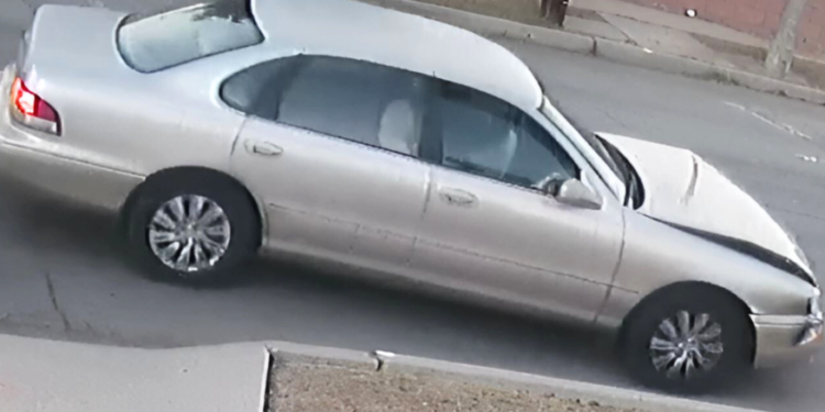 Surveillance image shows the suspect’s Toyota Avalon sedan with notable front-end damage. (Long Beach Police Department)