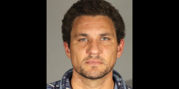 The suspect, Walter William Larkins, 37, is seen in a booking photo from the Santa Monica Police Department.