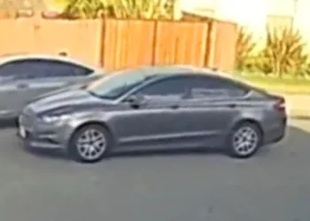 The suspect’s vehicle is a gray Ford Fusion sedan. The driver is wanted by police for striking two teens who were riding dirt bikes in Long Beach.
