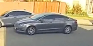 The suspect’s vehicle is a gray Ford Fusion sedan. The driver is wanted by police for striking two teens who were riding dirt bikes in Long Beach.