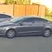 The suspect’s vehicle is a gray Ford Fusion sedan. The driver is wanted by police for striking two teens who were riding dirt bikes in Long Beach.