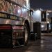 Close-up of a food truck at night with a portable generator and blurred surveillance-style background, illustrating an ongoing burglary investigation in Oxnard.