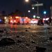 Broken glass and debris scattered on dark pavement at night on Avalon Boulevard in Florence, illustrating the aftermath of a hit-and-run collision.