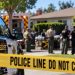 Daytime law enforcement response outside a Bellflower residence, with a sheriff’s vehicle, emergency responders and investigators blurred behind police tape.